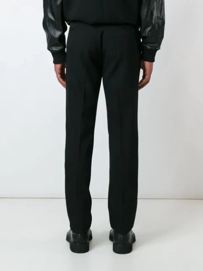 Shop Givenchy Tailored Straight-fit Trousers - Black