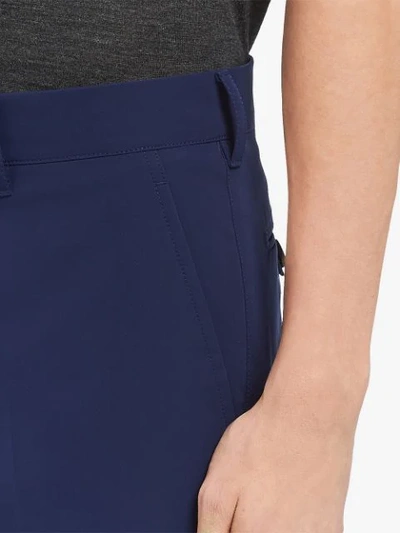 Shop Prada Techno Fabric Trousers In Blau
