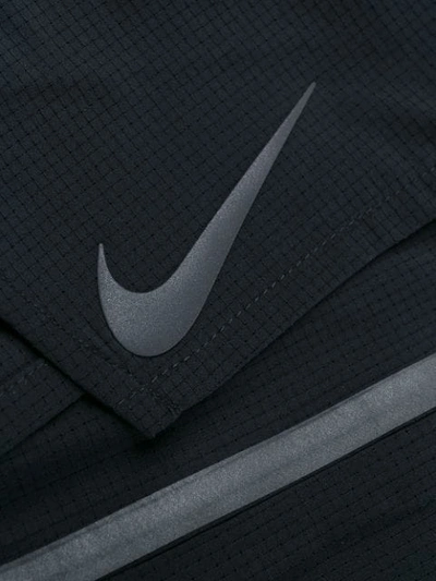 Shop Nike Reflect Swim Shorts In Black