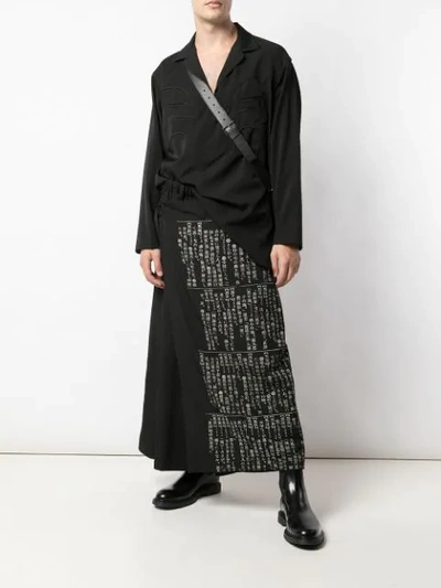 Shop Yohji Yamamoto Wide Wrap Kanji Pants In Black