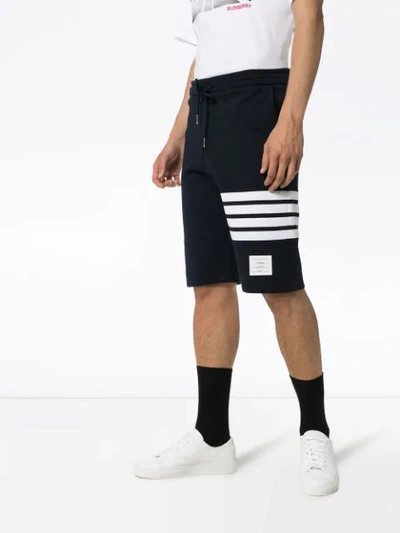Shop Thom Browne Striped Cotton-jersey Shorts In Blue