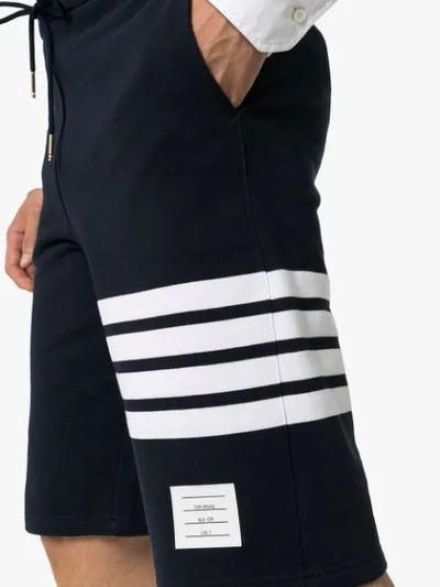 Shop Thom Browne Striped Cotton-jersey Shorts In Blue