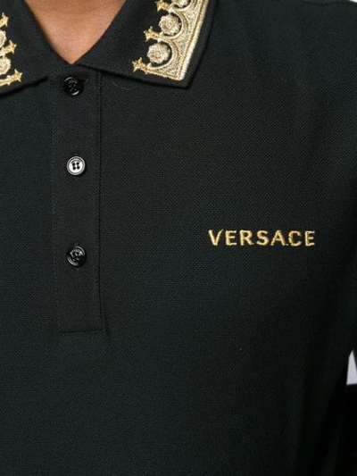 Shop Versace Contrasting Embroidery Polo Shirt In Black