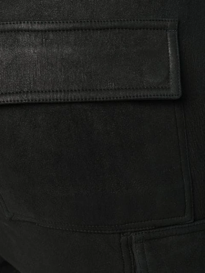 Shop Rick Owens Cargo Pocket Trousers In Black