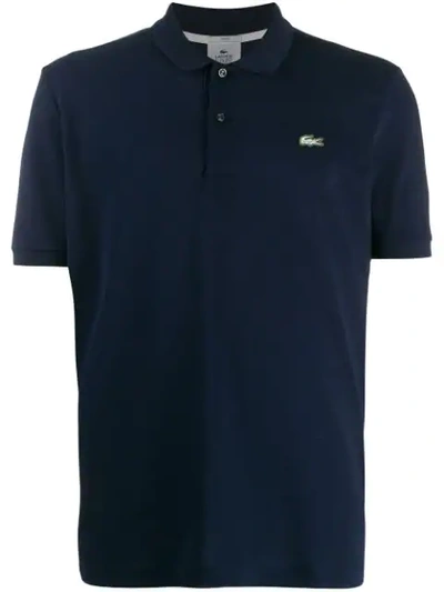 Shop Lacoste Logo Embroidered Polo Shirt In Blue