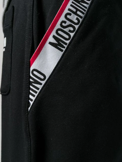 Shop Moschino Logo Trim Jogging Bottoms In Black