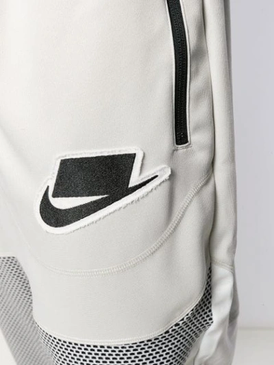 Shop Nike Mesh-panelled Sweatpants In Neutrals