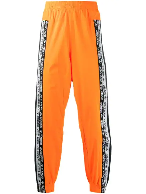 orange and black adidas pants