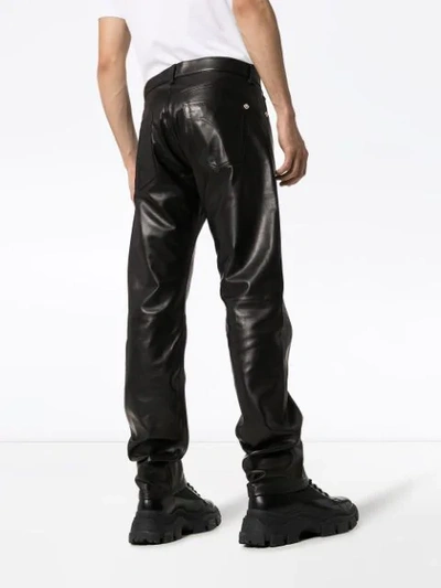 Shop Versace Straight-leg Leather Trousers In Black