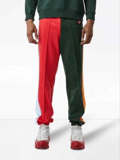 Shop Burberry Logo Graphic Colour Block Jersey Trackpants In Green