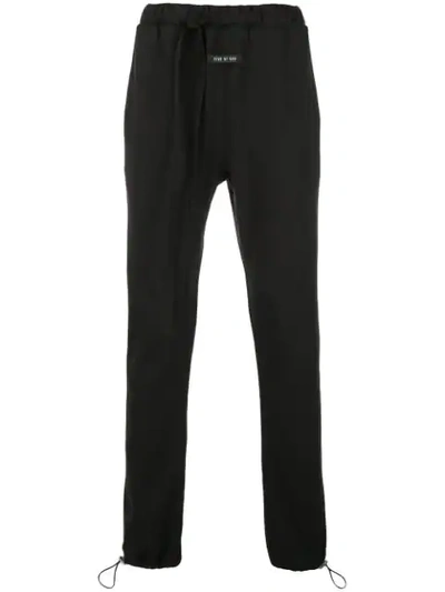 Shop Fear Of God Elasticated Track Pants In Black