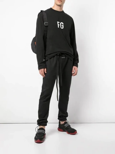 Shop Fear Of God Elasticated Track Pants In Black