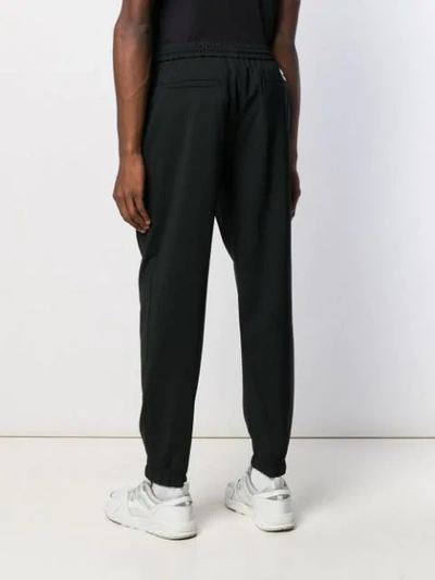 Shop Kenzo Elasticated-waist Tapered Trousers In Black