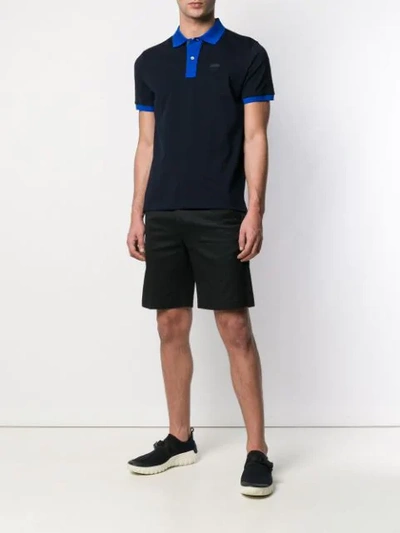 Shop Prada Logo Patch Polo Shirt In Blue