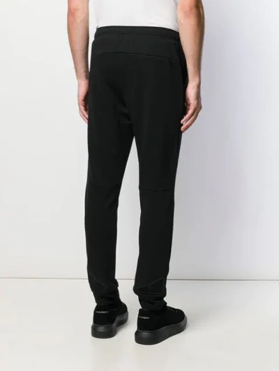 Shop Fendi Slim-fit Trackpants In Black