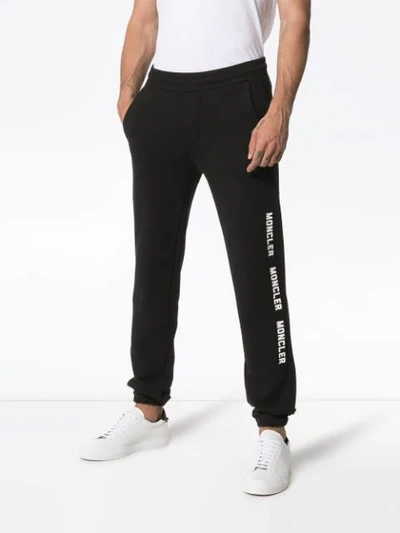 Shop Moncler Triple Logo Track Trousers In Black