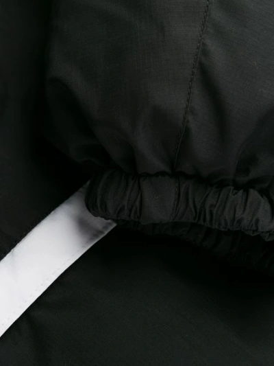 Shop Givenchy Mantel Mit Grafischem Logo In Black
