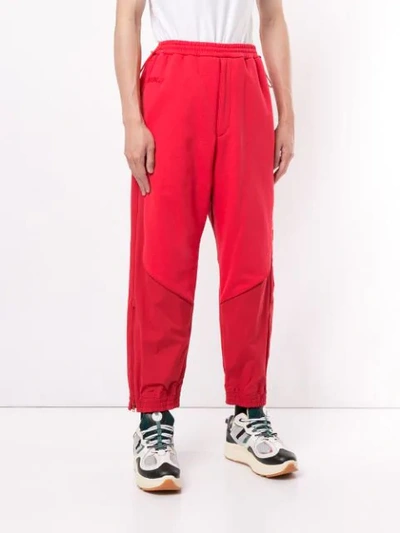 Shop Juunj Panelled Track Trousers In Red