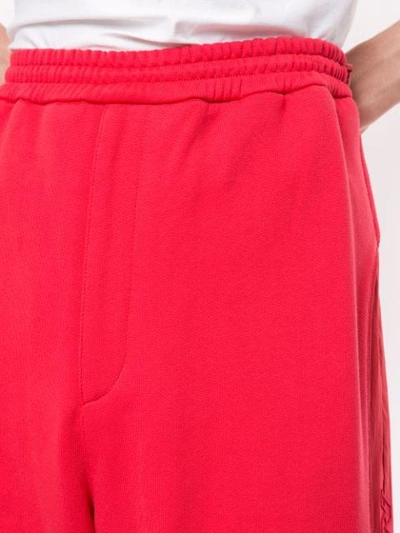 Shop Juunj Panelled Track Trousers In Red