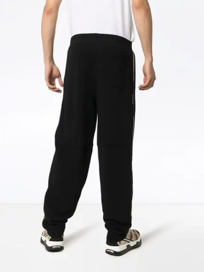 Shop Givenchy Logo-stripe Track Trousers In Black
