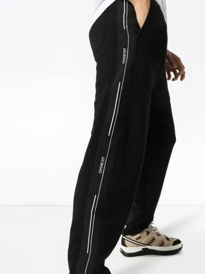 Shop Givenchy Logo-stripe Track Trousers In Black