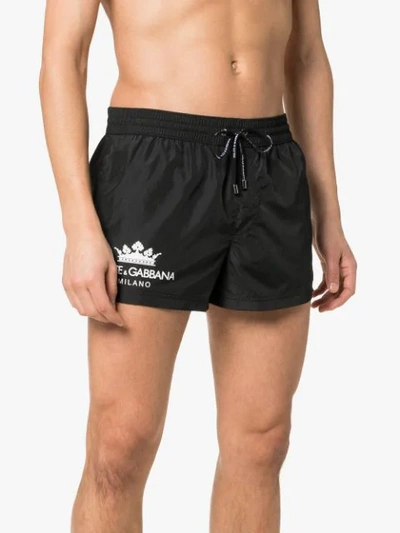 Shop Dolce & Gabbana Logo Printed Swim Shorts In Black