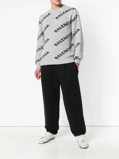 Shop Balenciaga B Embroidered Track Pants In Black