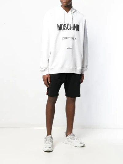Shop Moschino Logo Side Stripe Shorts In Black