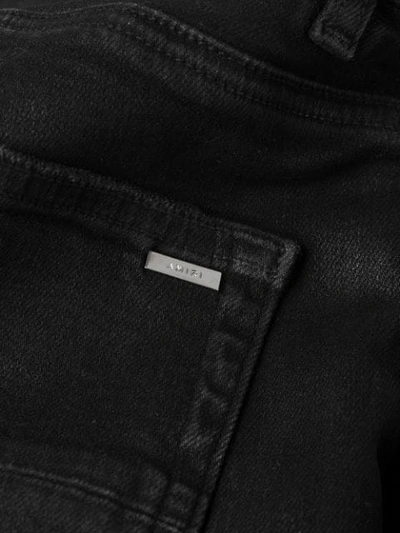 Shop Amiri Skinny Biker Jeans In Black