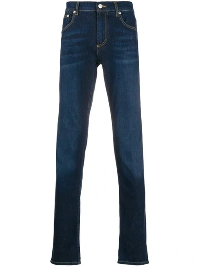 Shop Alexander Mcqueen Logo-embroidered Slim-fit Jeans In Blue