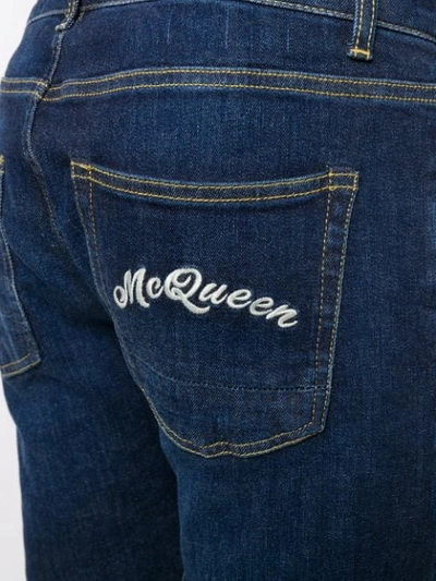 ALEXANDER MCQUEEN LOGO-EMBROIDERED SLIM-FIT JEANS - 蓝色