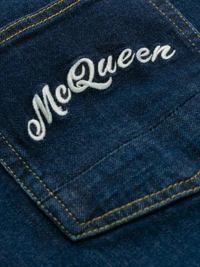 Shop Alexander Mcqueen Logo-embroidered Slim-fit Jeans In Blue