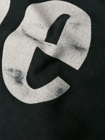 Shop Rhude Logo Print T-shirt In Black
