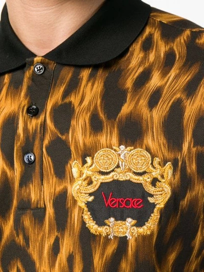 Shop Versace Animalier Embroidered Polo Shirt In Brown