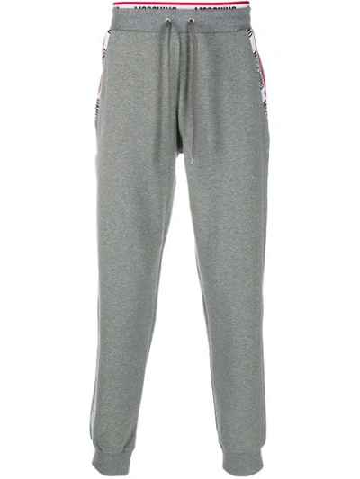 Shop Moschino Logo Trim Jogging Bottoms In Grey
