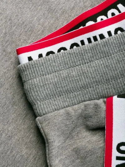 Shop Moschino Logo Trim Jogging Bottoms In Grey