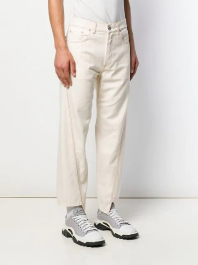 Shop Lanvin Asymmetric Straight-leg Jeans In White