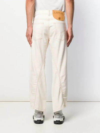 Shop Lanvin Asymmetric Straight-leg Jeans In White