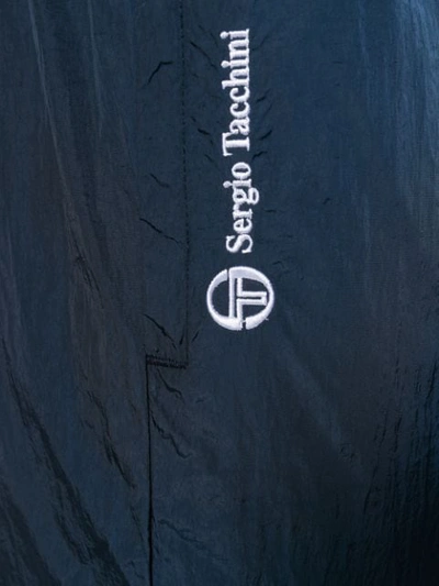 Shop Sergio Tacchini Logo Trackpants In Blue