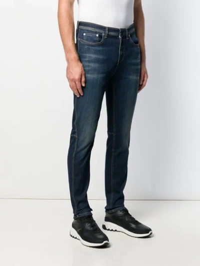 Shop Neil Barrett Slim Fit Jeans In Blue