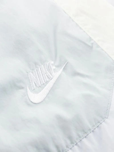 Shop Nike Paneled Track Pants In Blue