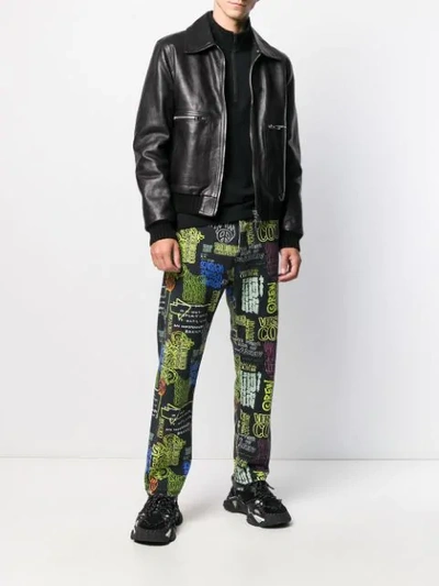 Shop Versace Jeans Couture Printed Detail Jeans In Black