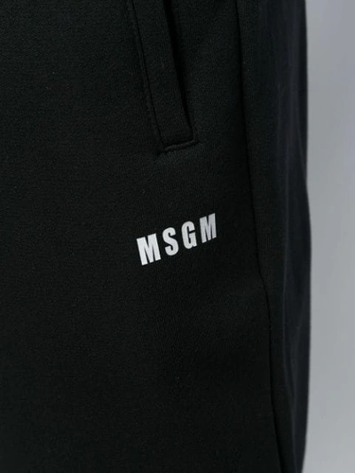 Shop Msgm Logo Detail Track Pants In Black