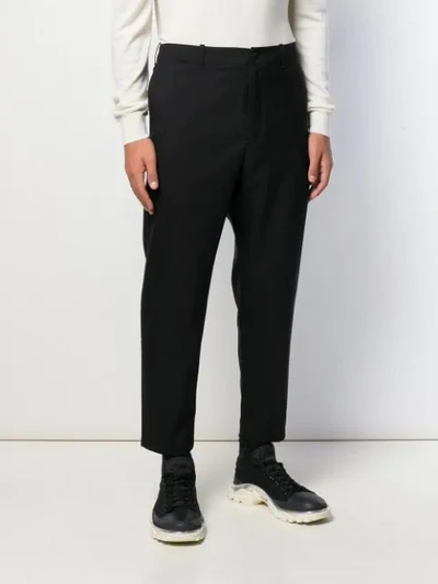 Shop Oamc Zip Leg Cropped Trousers In Black