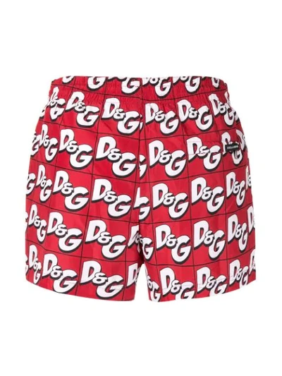 Shop Dolce & Gabbana Monogram Print Swim Shorts In Red