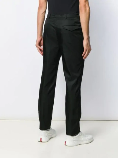 Shop Prada Regular Fit Trousers In Black