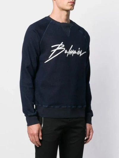 Shop Balmain Signature Logo Print Sweatshirt In Blue