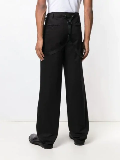 Shop Moschino Braces Trousers In Black