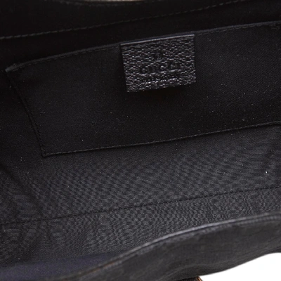 Shop Gucci Gg Canvas Nailhead Jackie Handbag In Black