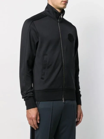 Shop Moncler Logo Patch Zipped Sweatshirt In Black